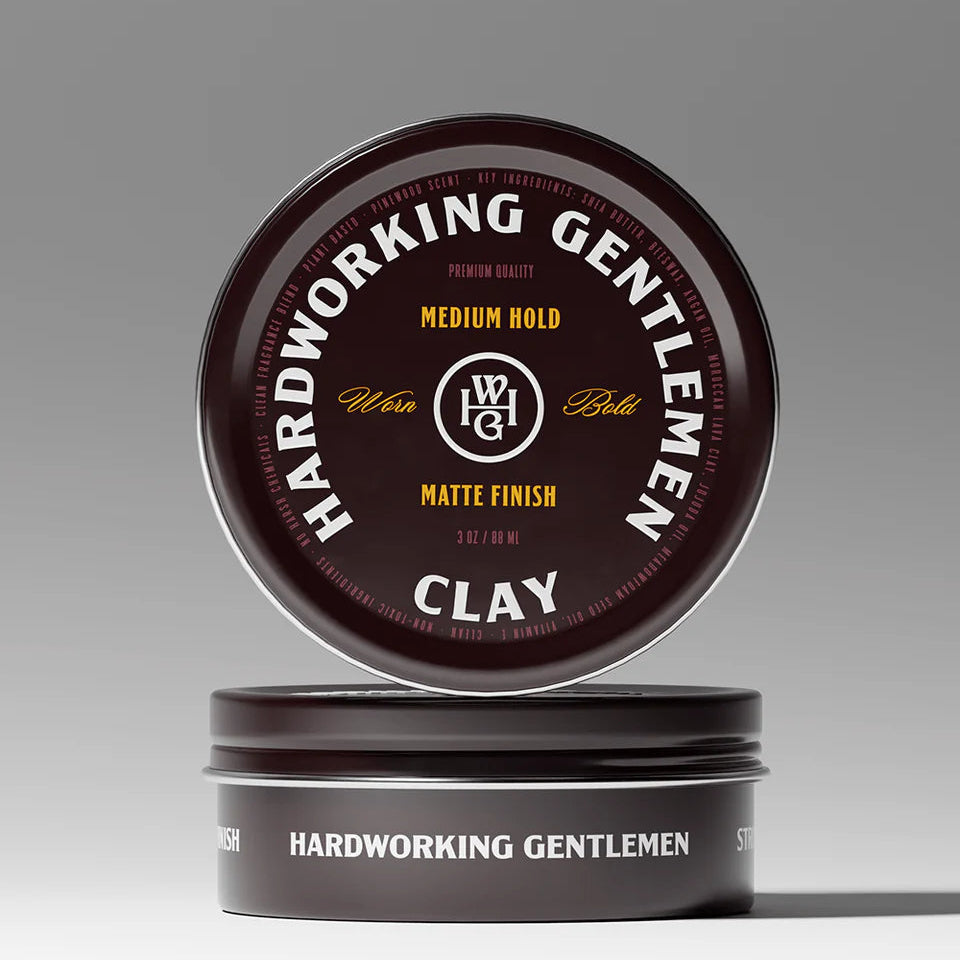 Hardworking Gentlemen clay product packaging on a gray background