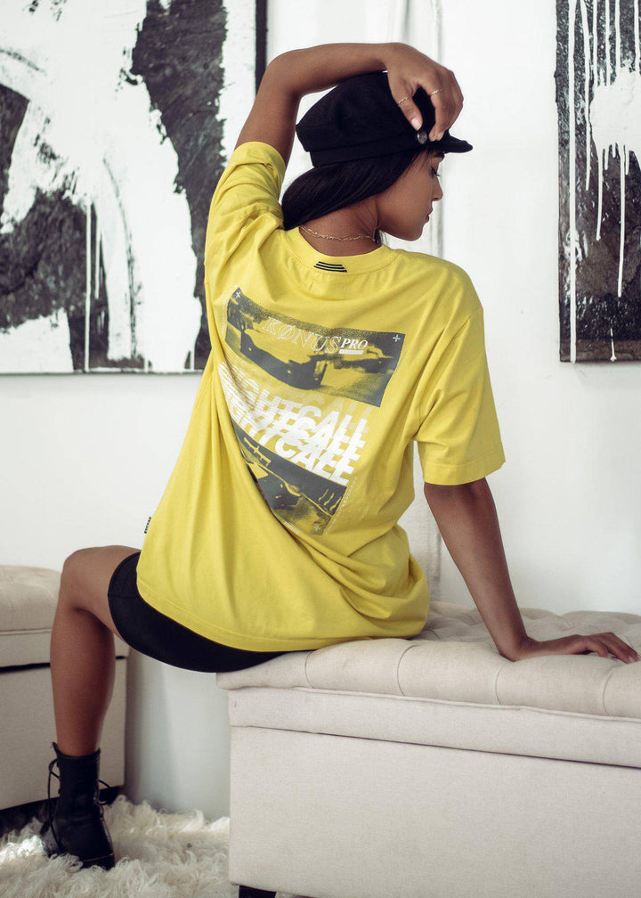 Konus Men's Graphic Tee in Yellow by Shop at Konus