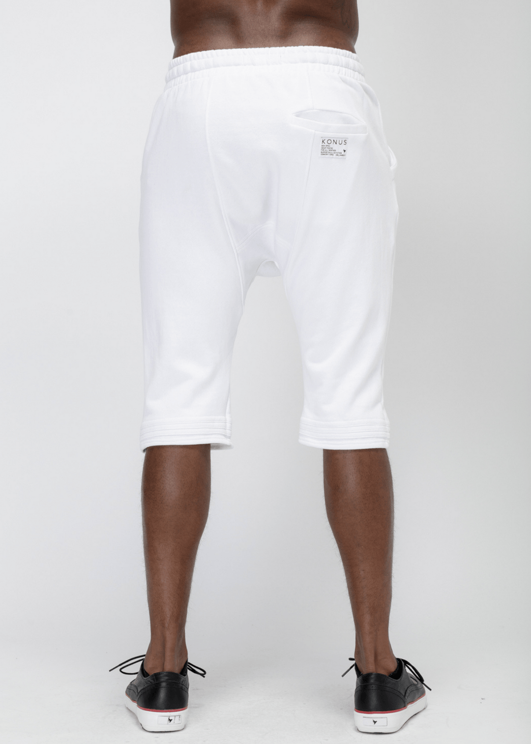 Konus Men's Loose End Shorts in White by Shop at Konus