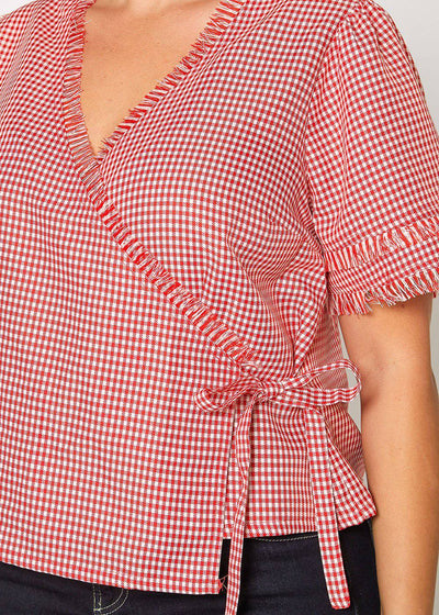 Plus Size Fringe Trim Gingham Wrap Blouse in Red Gingham by Shop at Konus