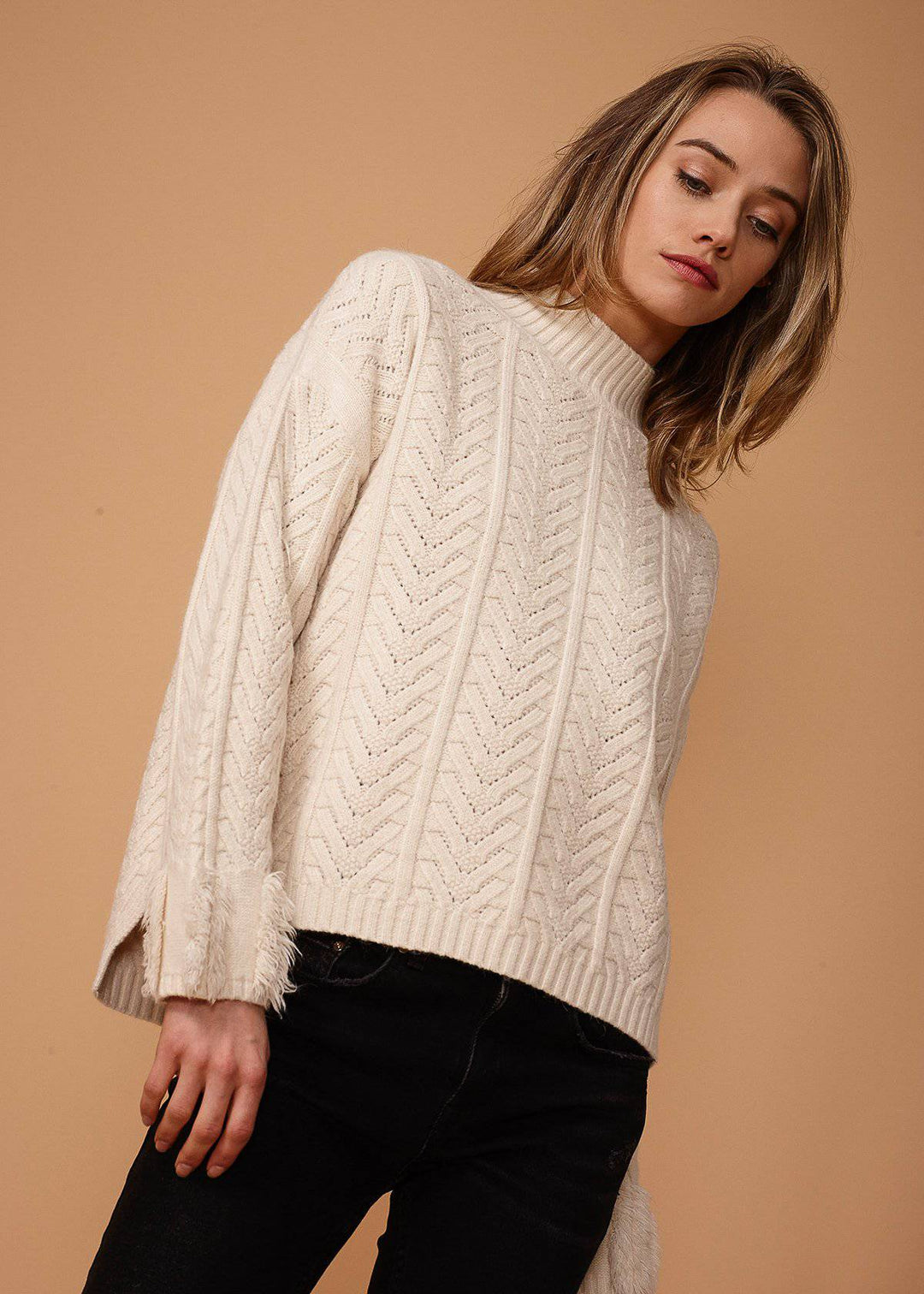 Women's Turtle Neck Fringe Sweater in Natural by Shop at Konus